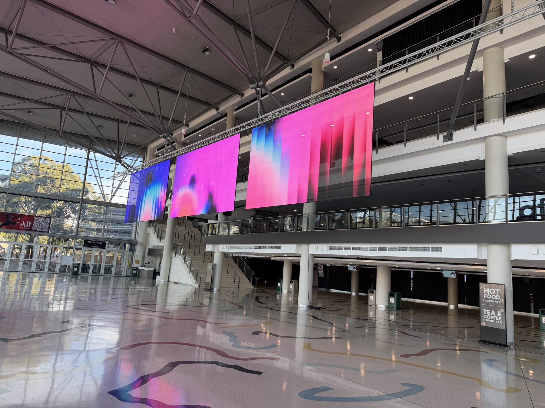 Transparent LED screens at Afterpay Arena, wide establishing view